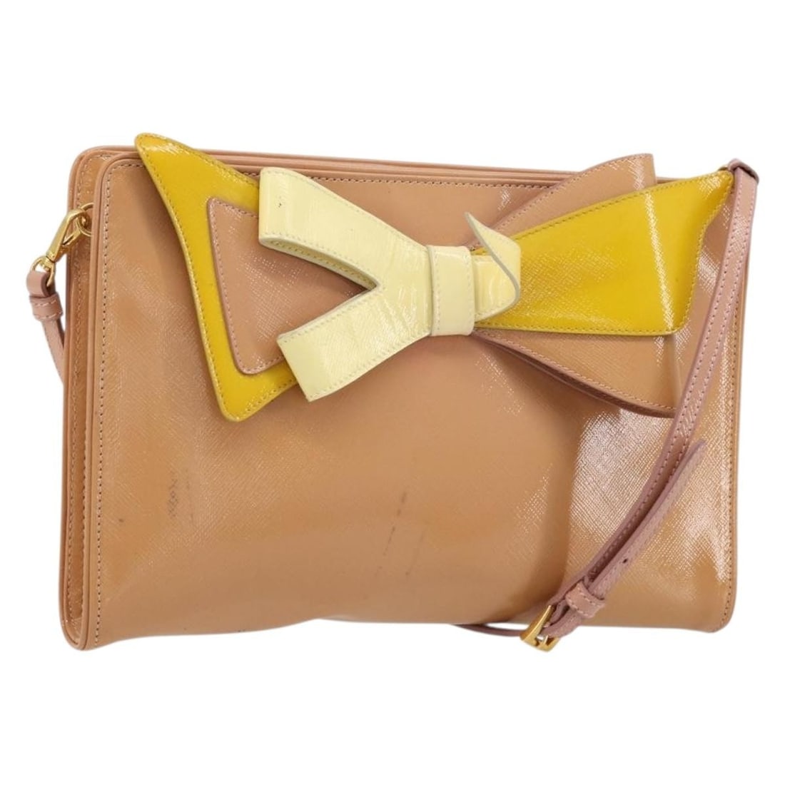 Prada pink patent leather shoulder bag with dust bag: Prada pink patent leather shoulder bag with dust bag This PRADA shoulder bag is crafted from pink and gold patent leather, offering a stylish and vibrant accessory for women. Made in Italy, the bag fe