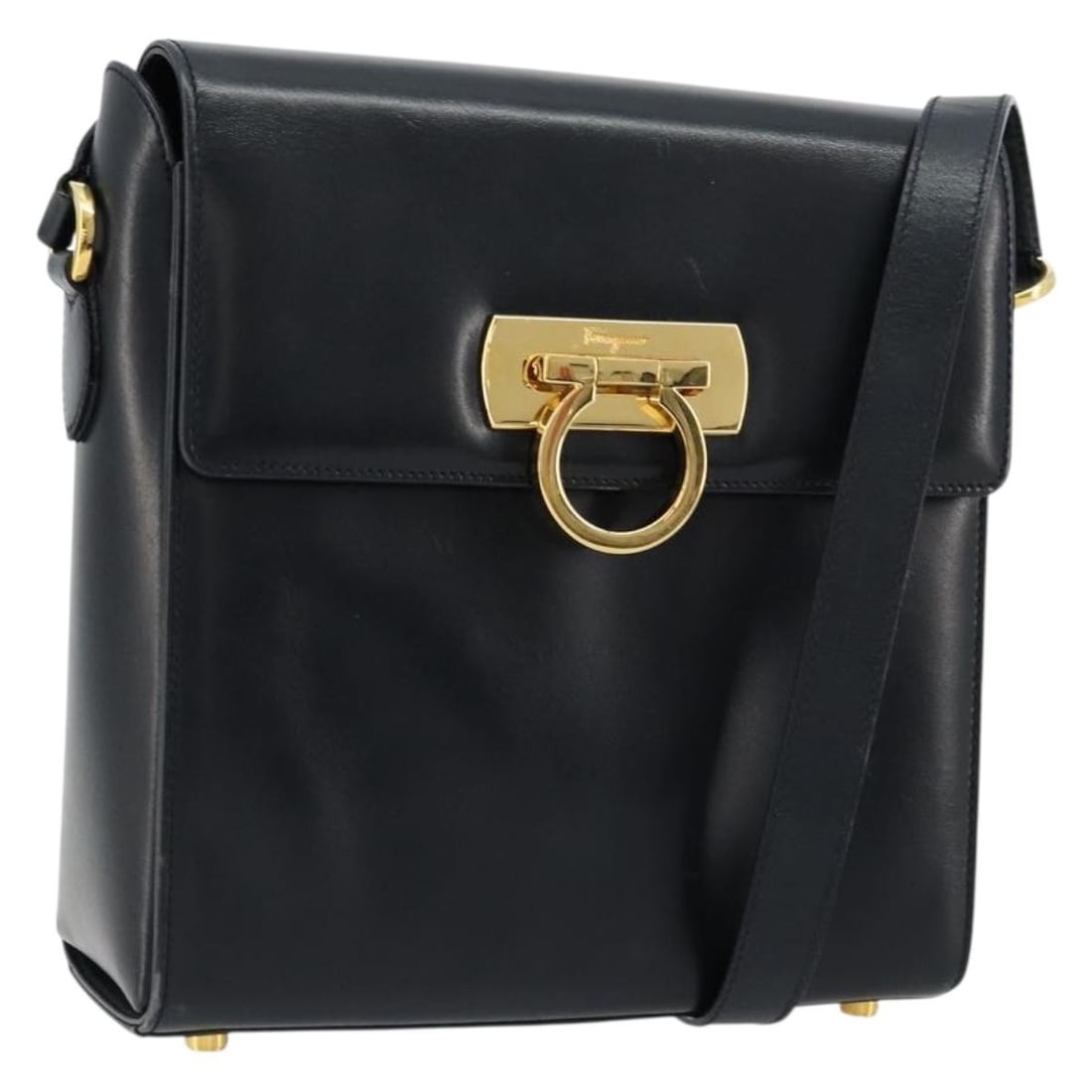 Salvatore Ferragamo Navy Gold Leather Gancini Shoulder Bag: Salvatore Ferragamo Navy Gold Leather Gancini Shoulder Bag This Salvatore Ferragamo Gancini shoulder bag is crafted from navy leather with gold-tone accents. Made in Italy, it features a compact desig