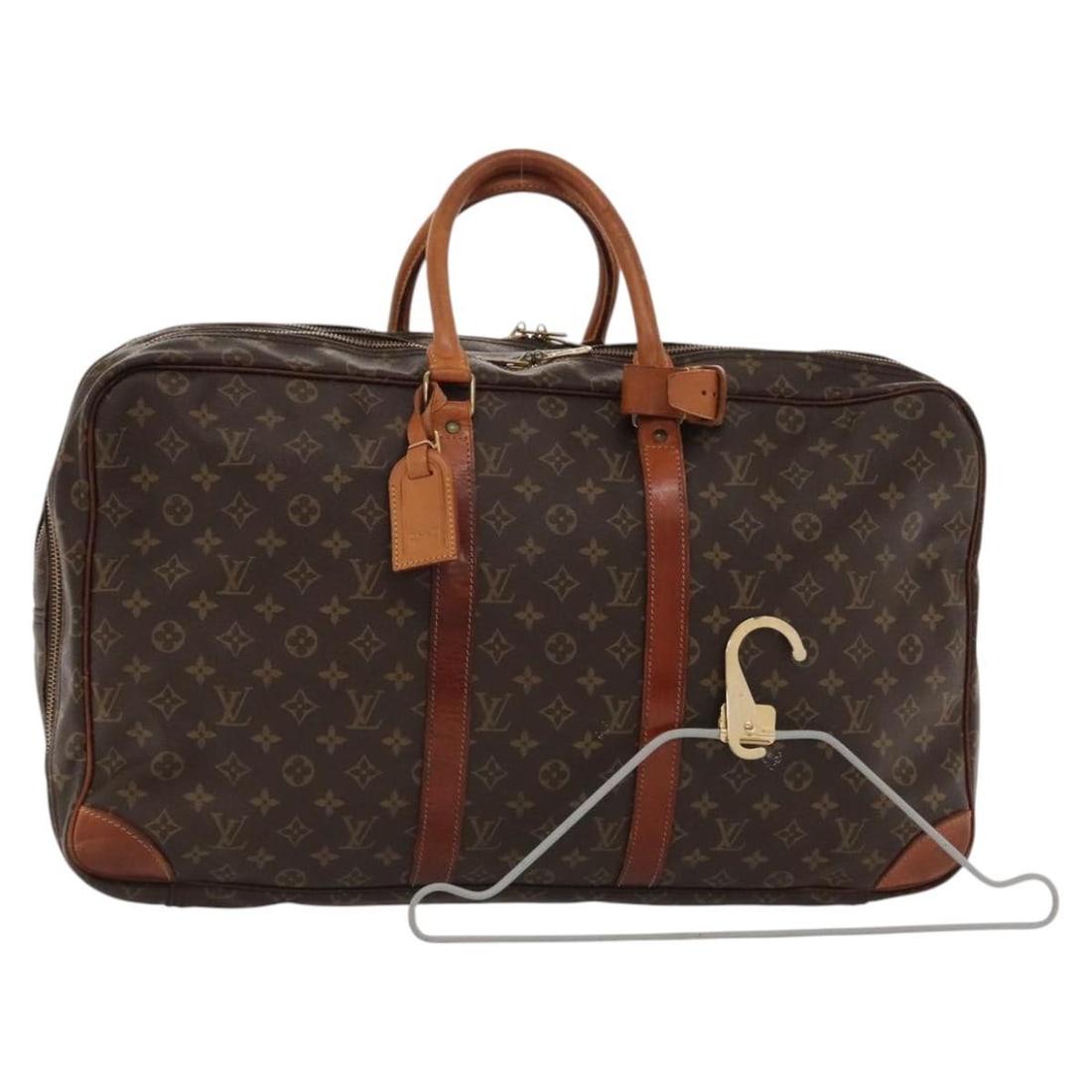 Louis Vuitton Sirius 55 Monogram Canvas Boston Travel Bag M41404 France: Louis Vuitton Sirius 55 Monogram Canvas Boston Travel Bag M41404 France This Louis Vuitton Monogram Sirius 55 Boston Bag is crafted from iconic Monogram canvas and features a spacious design. The bag 