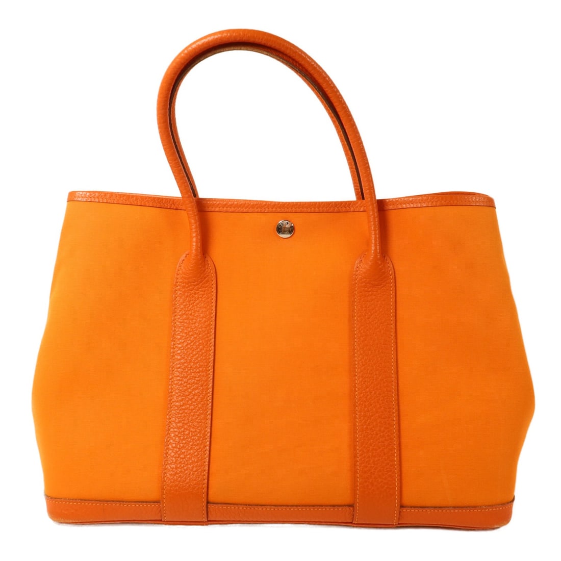 Hermes Garden Party PM Orange Canvas Handbag with PHW: Hermes Garden Party PM Orange Canvas Handbag with PHW Hermes Garden Party PM handbag in orange canvas with palladium-tone hardware. Made in France, this women's handbag features a hook button closure 