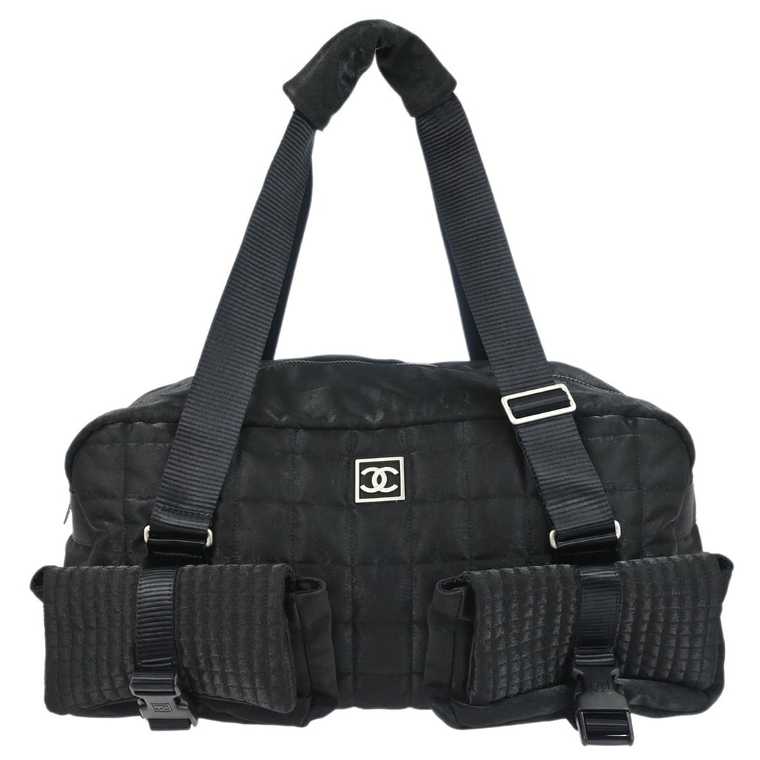 CHANEL Sport Line Black Nylon Large Duffle Handbag: CHANEL Sport Line Black Nylon Large Duffle Handbag Chanel Sport Line duffle handbag in black nylon with logo accents and a zip closure. Designed with three exterior pockets, one interior zip pocket, a