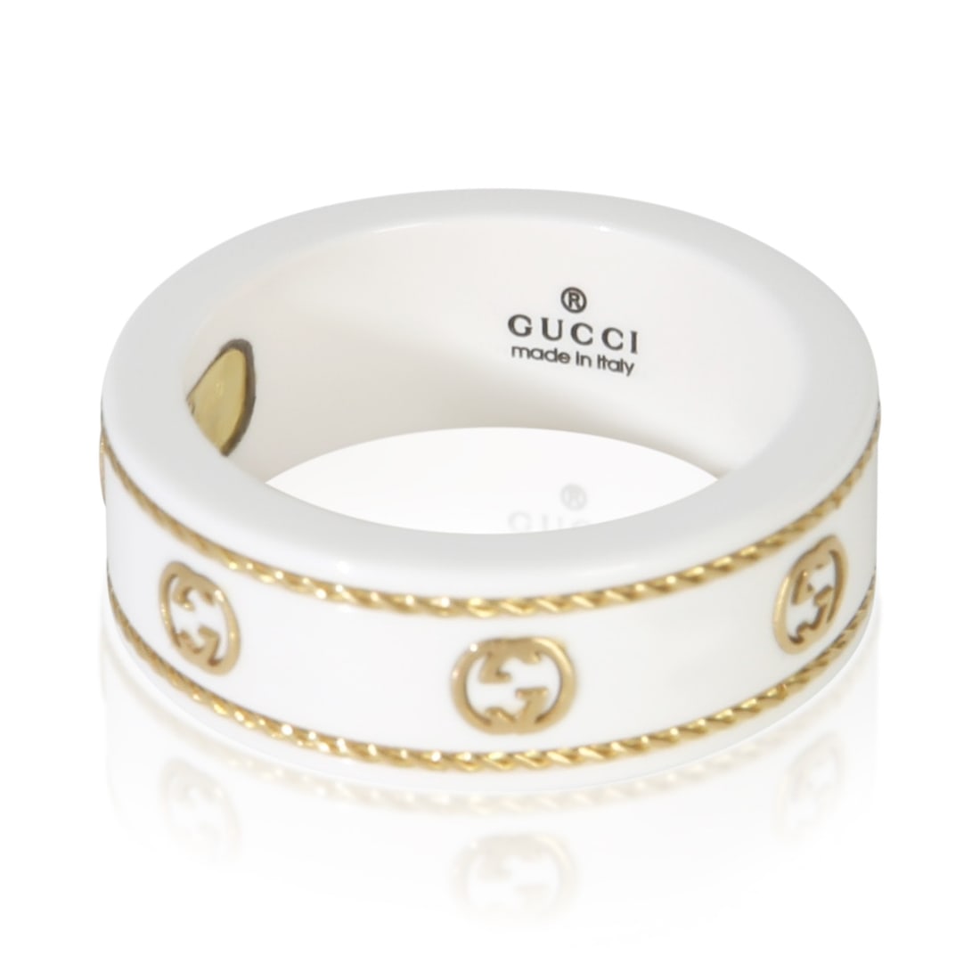 Gucci Icon 18k Yellow Gold Ceramic Ring Size 5.5: Gucci Icon 18k Yellow Gold Ceramic Ring Size 5.5 Pre-owned Gucci Icon ring from the women's collection, crafted in ceramic and 18k yellow gold. This ring comes with a pouch and features the clean, sto