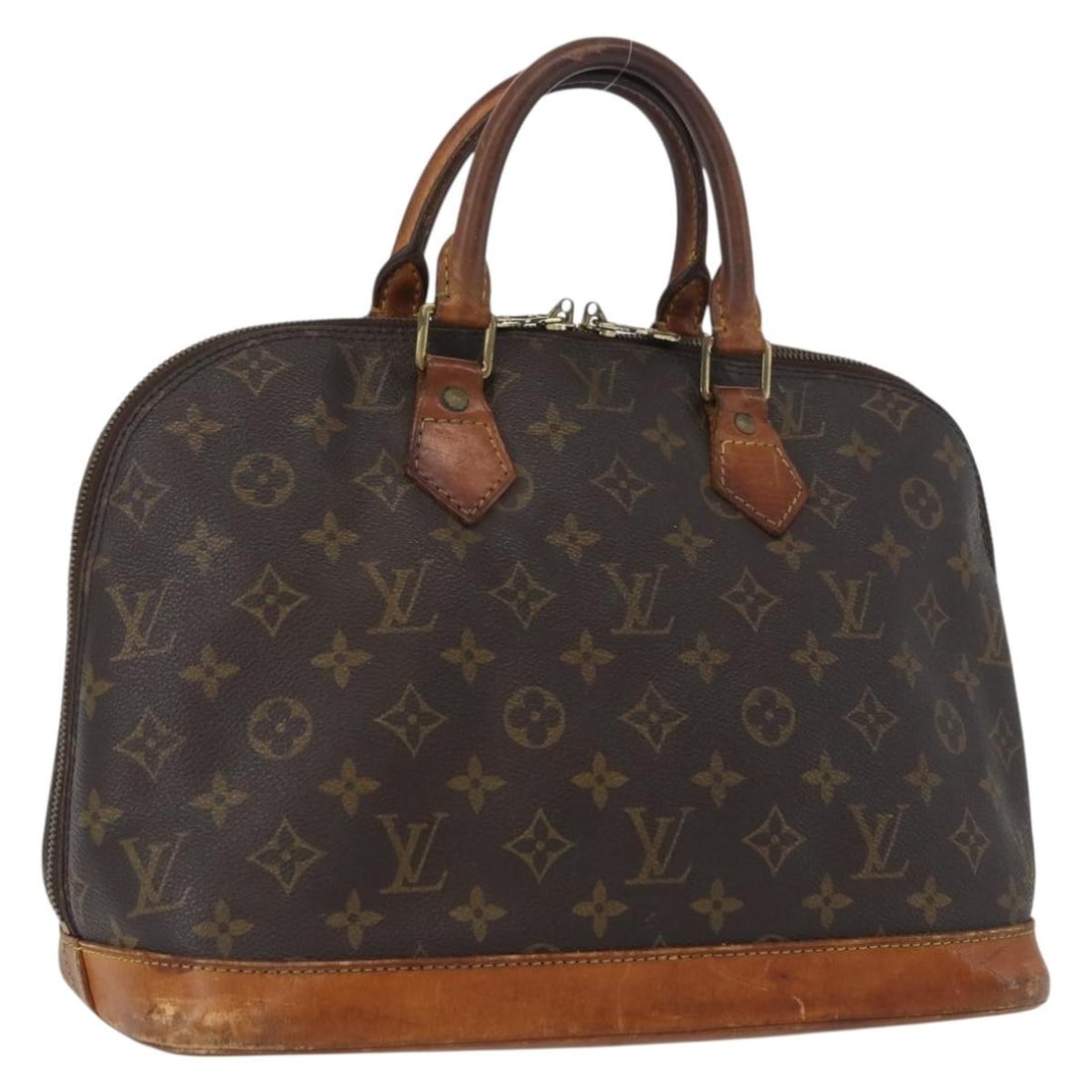 Monogram Canvas Alma Handbag by Louis Vuitton Model M51130: Monogram Canvas Alma Handbag by Louis Vuitton Model M51130 This Louis Vuitton Alma handbag features the signature Monogram canvas exterior and is crafted in France. The bag shows significant signs of 