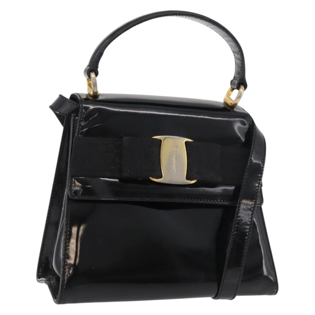 Salvatore Ferragamo Vala Patent Leather Black Gold Shoulder Bag: Salvatore Ferragamo Vala Patent Leather Black Gold Shoulder Bag This Salvatore Ferragamo Vala handbag is crafted from black patent leather with gold-tone accents. Designed for versatility, it can be c