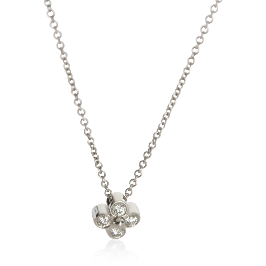 Tiffany & Co. Lace Platinum Diamond Pendant with Box and Pouch: Tiffany & Co. Lace Platinum Diamond Pendant with Box and Pouch This pre-owned Tiffany & Co. Lace Pendant is crafted from platinum and features a round brilliant diamond with a total carat weight of 0.