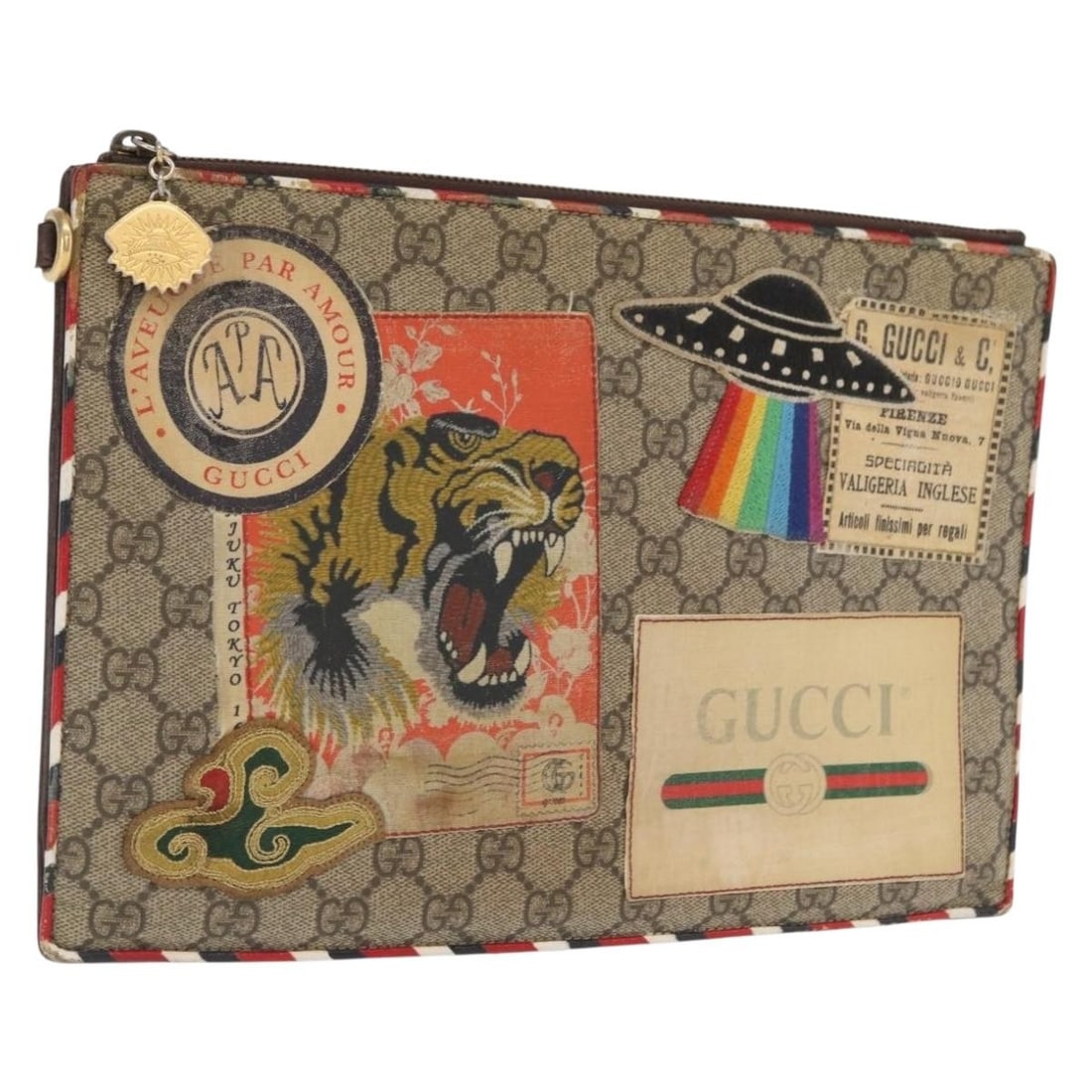 GUCCI 473915 Courier GG Supreme Beige PVC Leather Clutch: GUCCI 473915 Courier GG Supreme Beige PVC Leather Clutch Gucci GG Supreme Courier clutch bag in beige PVC leather and GG canvas. Made in Italy, this women's clutch is offered without the original box 
