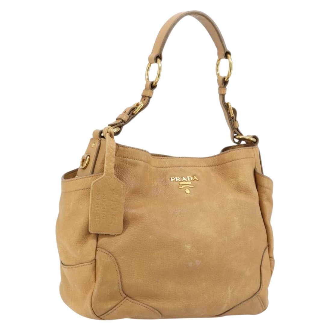 PRADA Leather Shoulder Bag Beige with Guarantee Card: PRADA Leather Shoulder Bag Beige with Guarantee Card Prada shoulder bag in beige and gold leather, made in Italy. This women's bag includes the guarantee card. Condition is heavily used, with visible 