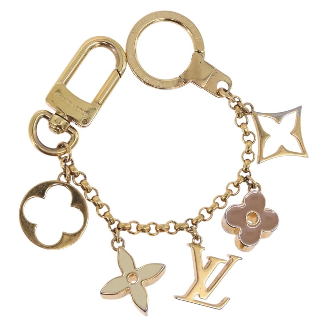 Louis Vuitton M65111 Fleur De Charm Gold Tone Metal Bag Charm: Louis Vuitton M65111 Fleur De Charm Gold Tone Metal Bag Charm Louis Vuitton Fleur De Charm in gold-tone metal. This women's charm is made in Italy and shows noticeable signs of use, including surface 