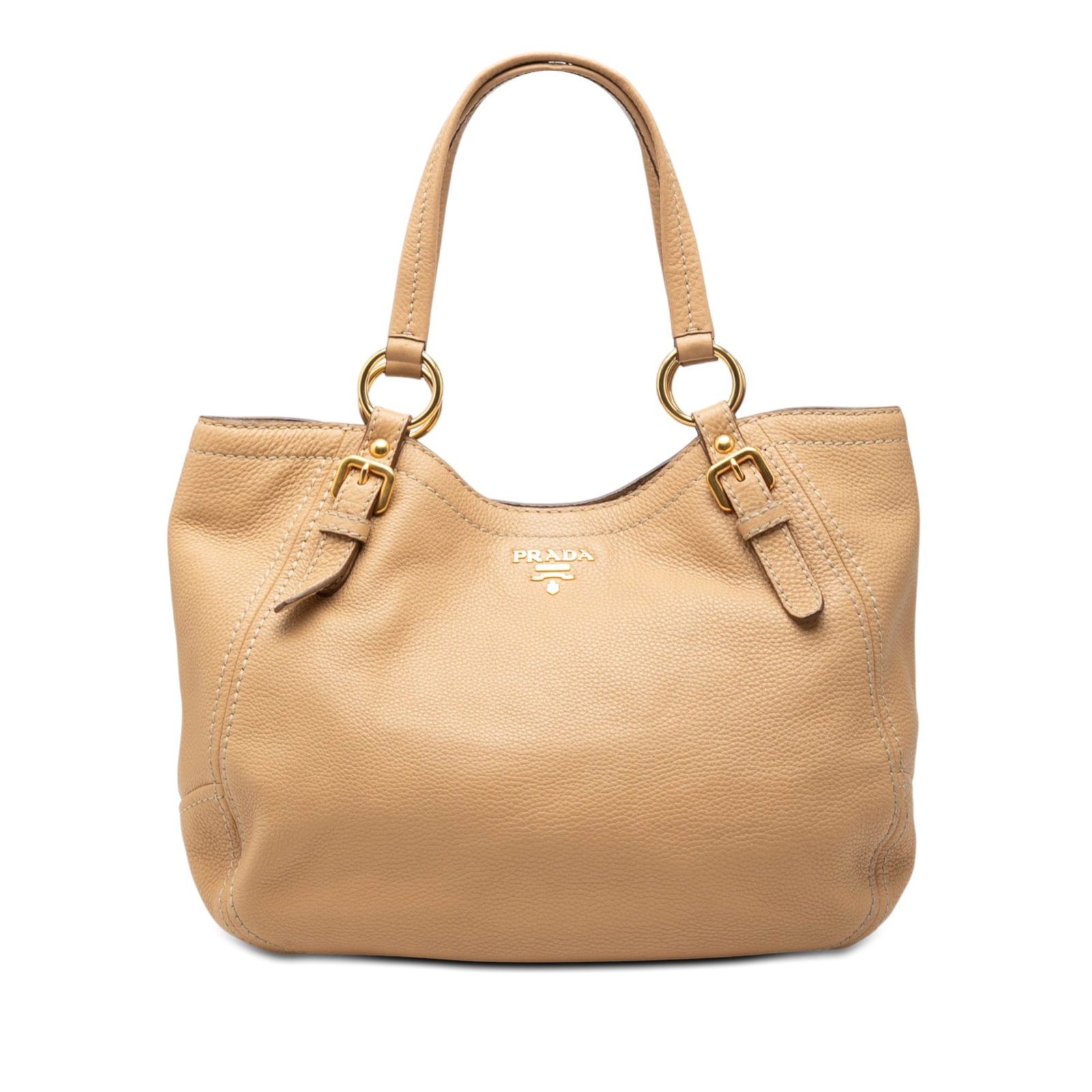 Prada Vitello Daino beige leather tote bag: Prada Vitello Daino beige leather tote bag Prada Vitello Daino tote bag in beige leather with flat straps, an open top with snap button closure, and interior zip and slip pockets. Condition is B+ with