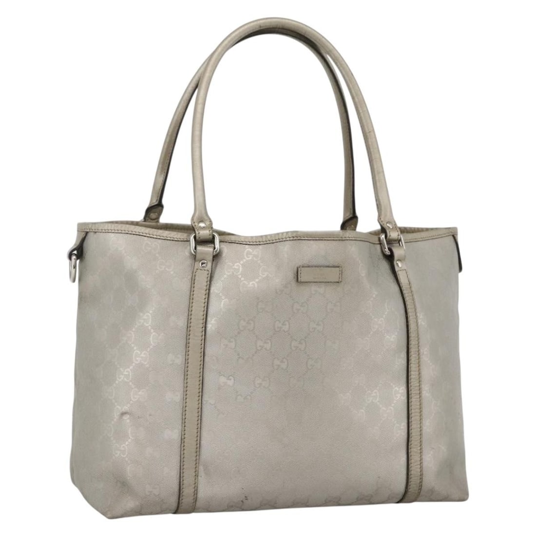 Gucci 197953 GG Canvas PVC Tote Handbag Silver: Gucci 197953 GG Canvas PVC Tote Handbag Silver Gucci tote bag in silver PVC leather with GG canvas detailing. This women's bag was made in Italy and comes as the bag only; item box and dust bag are no