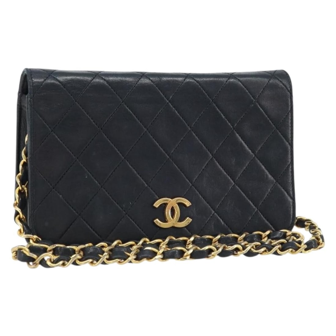 CHANEL leather shoulder bag black with gold tone chain CC: CHANEL leather shoulder bag black with gold tone chain CC CHANEL Matelasse chain shoulder bag in black and gold leather, made in France. This women's shoulder bag features a compact silhouette with a 