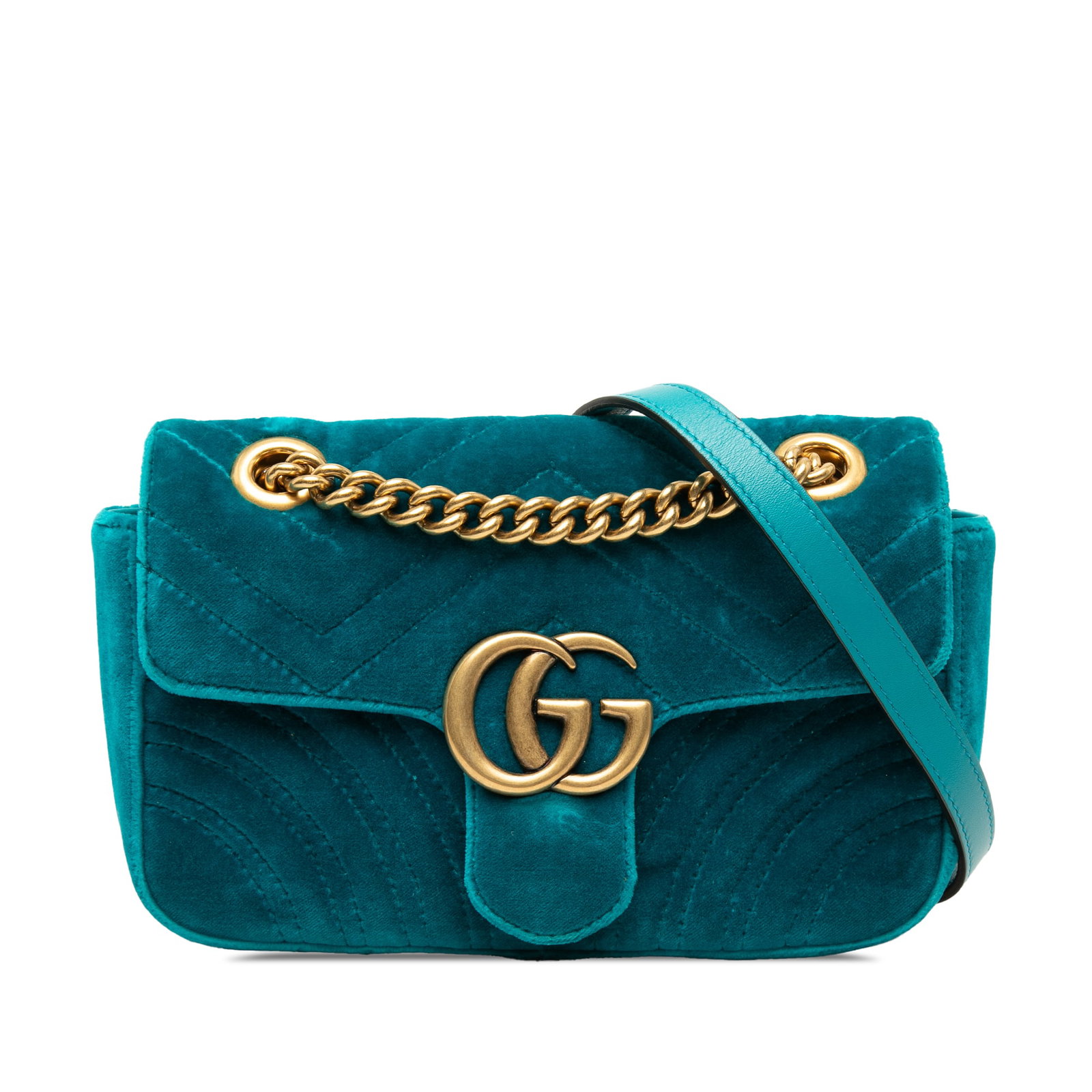 Gucci GG Marmont Small Blue Velvet Shoulder Bag: Gucci GG Marmont Small Blue Velvet Shoulder Bag Gucci Small GG Marmont Matelasse shoulder bag in blue quilted velvet with a chain link shoulder strap and leather guard. The bag features a flap with pu