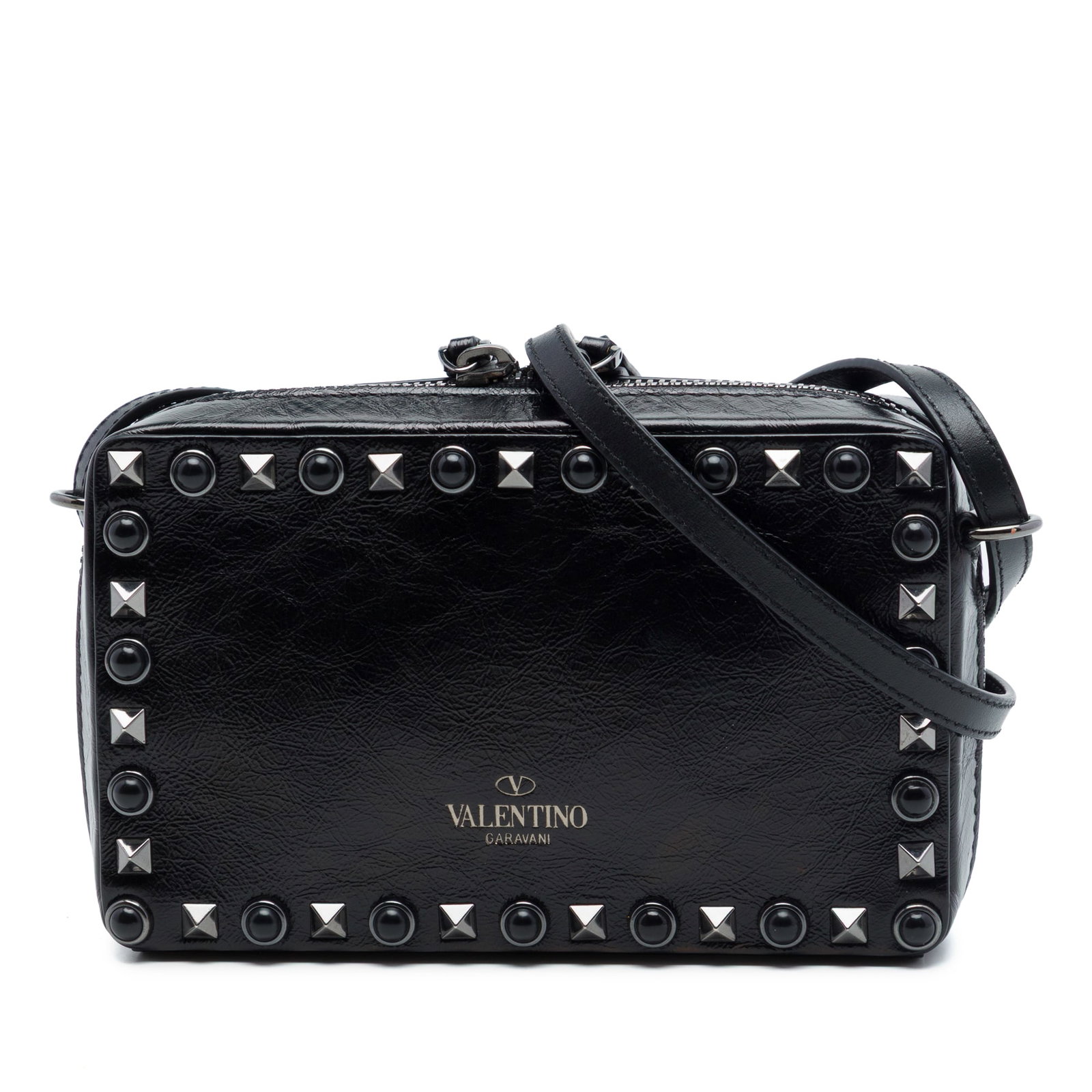 Valentino Rockstud Camera Crossbody Bag in Black Textured Leather: Valentino Rockstud Camera Crossbody Bag in Black Textured Leather Valentino textured leather Rolling Rockstud camera bag in black. This crossbody style features Rockstud embellishments, a studded flat