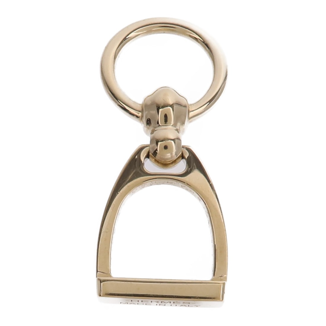 Hermes Etrier Twilly scarf ring brass gold tone charms: Hermes Etrier Twilly scarf ring brass gold tone charms Hermes Etrier Twilly scarf ring in gold-tone brass with charm detailing. Made in France, this women's accessory is designed to style and secure a