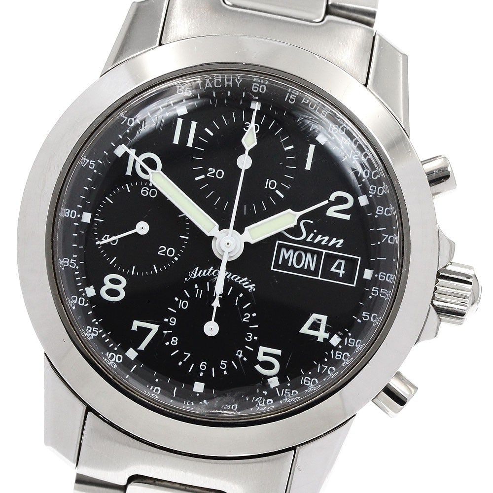 Sinn 103.B.AUTO.POL.TY mens automatic chronograph wristwatch day date: Sinn 103.B.AUTO.POL.TY mens automatic chronograph wristwatch day date Pre-owned Sinn 103.B.AUTO.POL.TY men's wristwatch with automatic movement, a black dial, and chronograph functionality. This watch
