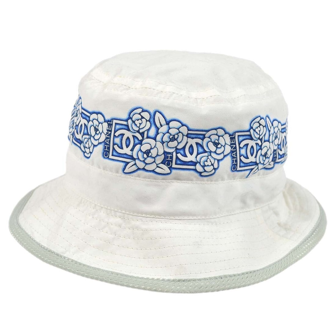 CHANEL Sport Line White Polyester Bucket Hat Size M: CHANEL Sport Line White Polyester Bucket Hat Size M White Chanel Sport Line bucket hat in 100% polyester with a casual design. Made in Italy, this women's hat is sized M and features a white colorway 