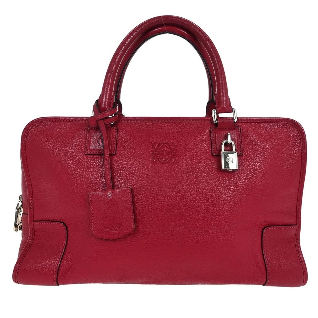 Red Leather Amazona 36 Handbag by Loewe Spain: Red Leather Amazona 36 Handbag by Loewe Spain This pre-owned Loewe Amazona 36 handbag is crafted from red leather and designed for women. It features minor signs of use, including slight dirt on the h