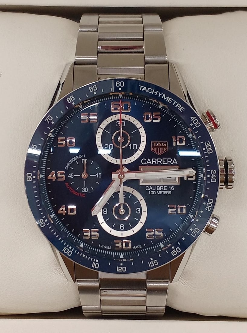 TAG Heuer CV2A1V WUD9741 Carrera 16 mens stainless steel wristwatch: TAG Heuer CV2A1V WUD9741 Carrera 16 mens stainless steel wristwatch Pre-owned TAG Heuer Carrera Caliber 16 men's wristwatch with automatic movement and a stainless steel case and band. This Swiss-made