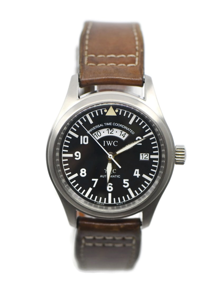IWC IW325101 Pilot UTC automatic stainless steel wristwatch: IWC IW325101 Pilot UTC automatic stainless steel wristwatch Pre-owned IWC Pilot UTC wristwatch in stainless steel with a black analog dial and brown two-piece strap. This men's automatic watch feature