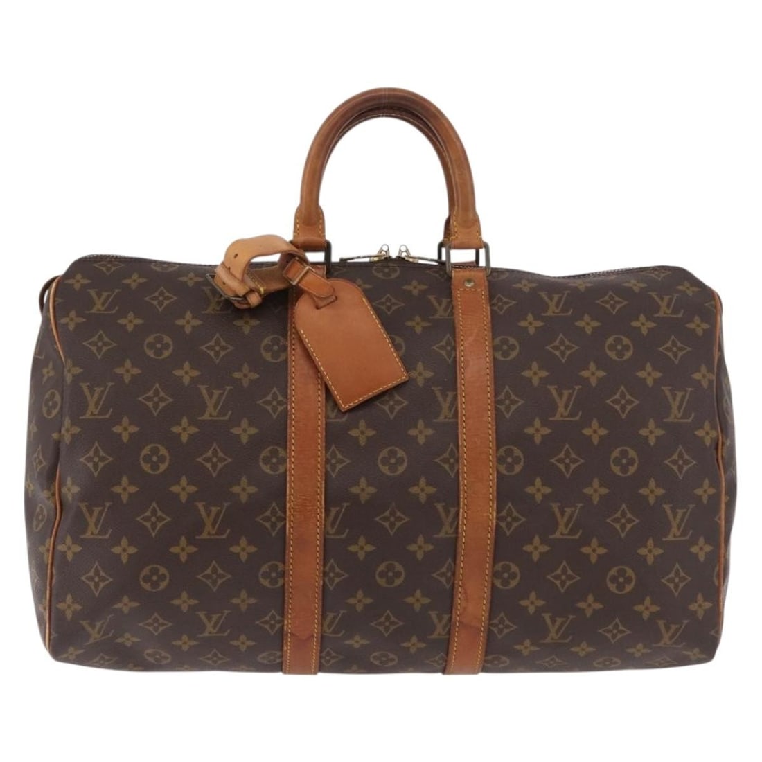 Louis Vuitton Keepall Brown Monogram Canvas Travel Bag: Louis Vuitton Keepall Brown Monogram Canvas Travel Bag Louis Vuitton Keepall in brown monogram canvas. This unisex bag is made in France and presents in fair overall condition, with visible wear throu