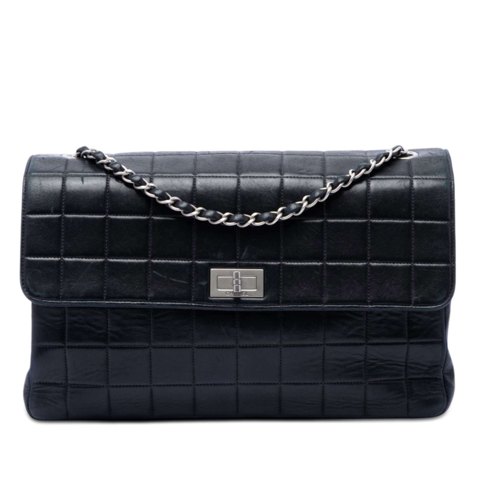 Chanel Reissue 2.55 Chocolate Bar Lambskin Crossbody Flap Bag: Chanel Reissue 2.55 Chocolate Bar Lambskin Crossbody Flap Bag Chanel Chocolate Bar Lambskin Reissue 2.55 Single Flap crossbody bag in black quilted lambskin leather. It features a leather-woven chain 