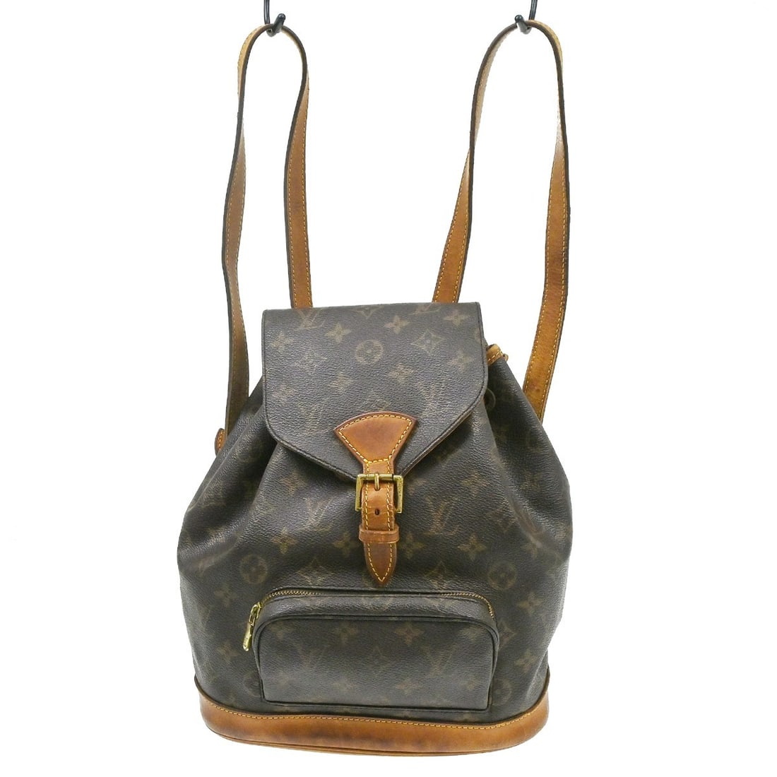 Louis Vuitton Montsouris MM Monogram Canvas Backpack M51136: Louis Vuitton Montsouris MM Monogram Canvas Backpack M51136 Vintage Louis Vuitton Montsouris MM backpack bag in brown Monogram canvas with leather trim. This medium backpack features a flap buckle and
