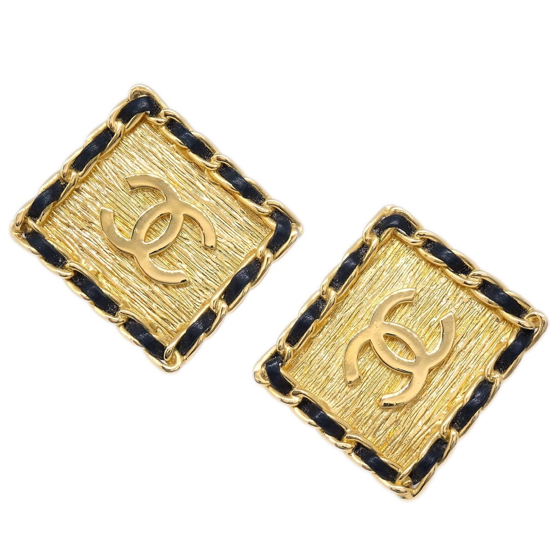 CHANEL Rhombus Clip-On Earrings Gold Plated Leather Button Style: CHANEL Rhombus Clip-On Earrings Gold Plated Leather Button Style Clip-on Chanel button earrings in a square rhombus design, crafted in gold-plated metal with black leather accents. These earrings are 