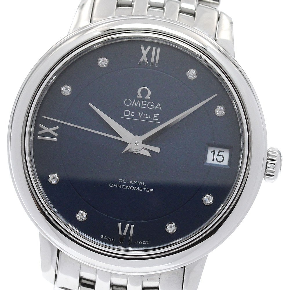 Omega De Ville Prestige ladies wristwatch ref 424.10.33.20.53.001 date: Omega De Ville Prestige ladies wristwatch ref 424.10.33.20.53.001 date Pre-owned OMEGA De Ville Prestige ladies wristwatch with a navy dial, automatic Co-Axial movement, and date display. This watch-o