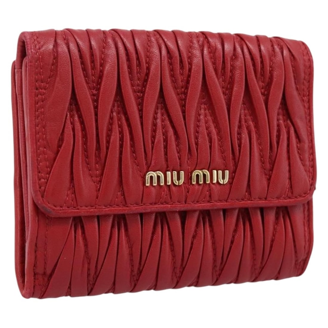 Miu Miu red leather bifold wallet with gold tone hardware: Miu Miu red leather bifold wallet with gold tone hardware Authentic Miu Miu matelasse bifold wallet in red leather with gold-tone accents. This women's wallet is made in Turkey and comes as the wallet
