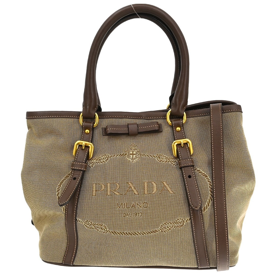 PRADA 2way tote bag beige canvas leather with shoulder strap: PRADA 2way tote bag beige canvas leather with shoulder strap Prada 2way tote bag in beige canvas and leather with double handles and logo accents. Made in Italy, this medium tote features an interior 