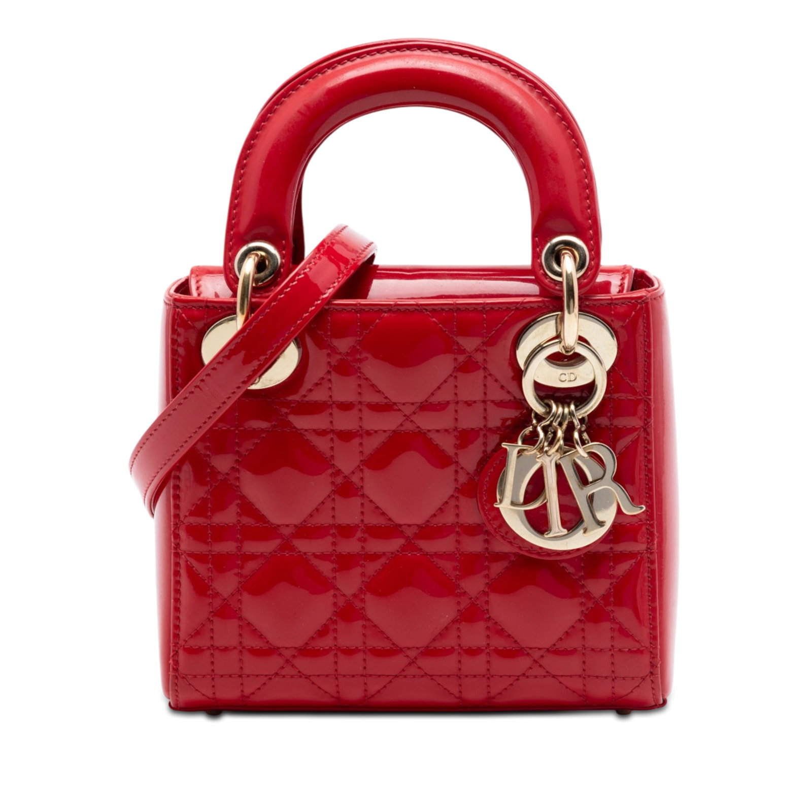 Dior Lady Dior Mini Cannage Patent Leather Handbag Red: Dior Lady Dior Mini Cannage Patent Leather Handbag Red This Dior Lady Dior bag is crafted in red quilted patent leather with flat top handles and a detachable chain strap with a leather shoulder guard
