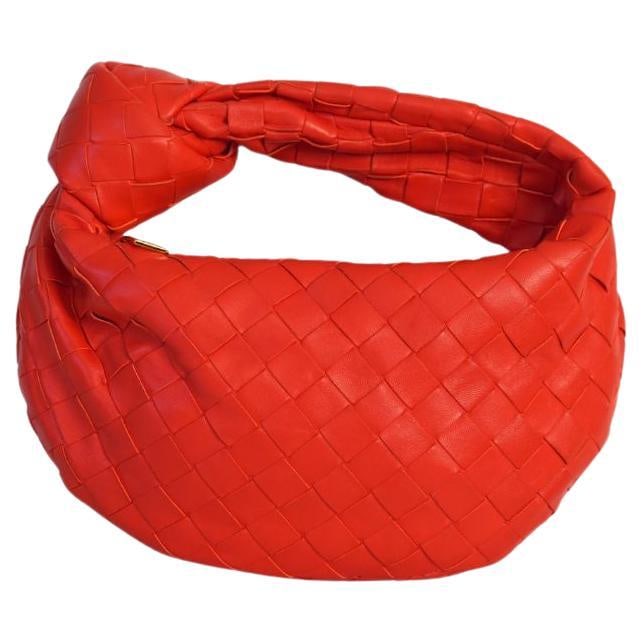 Bottega Veneta Mini Jodie Nappa Intrecciato Bag Sunburst: Bottega Veneta Mini Jodie Nappa Intrecciato Bag Sunburst Bottega Veneta Nappa Intrecciato Mini Jodie Sunburst handbag from the 21st century. It is described as being in good overall condition with min