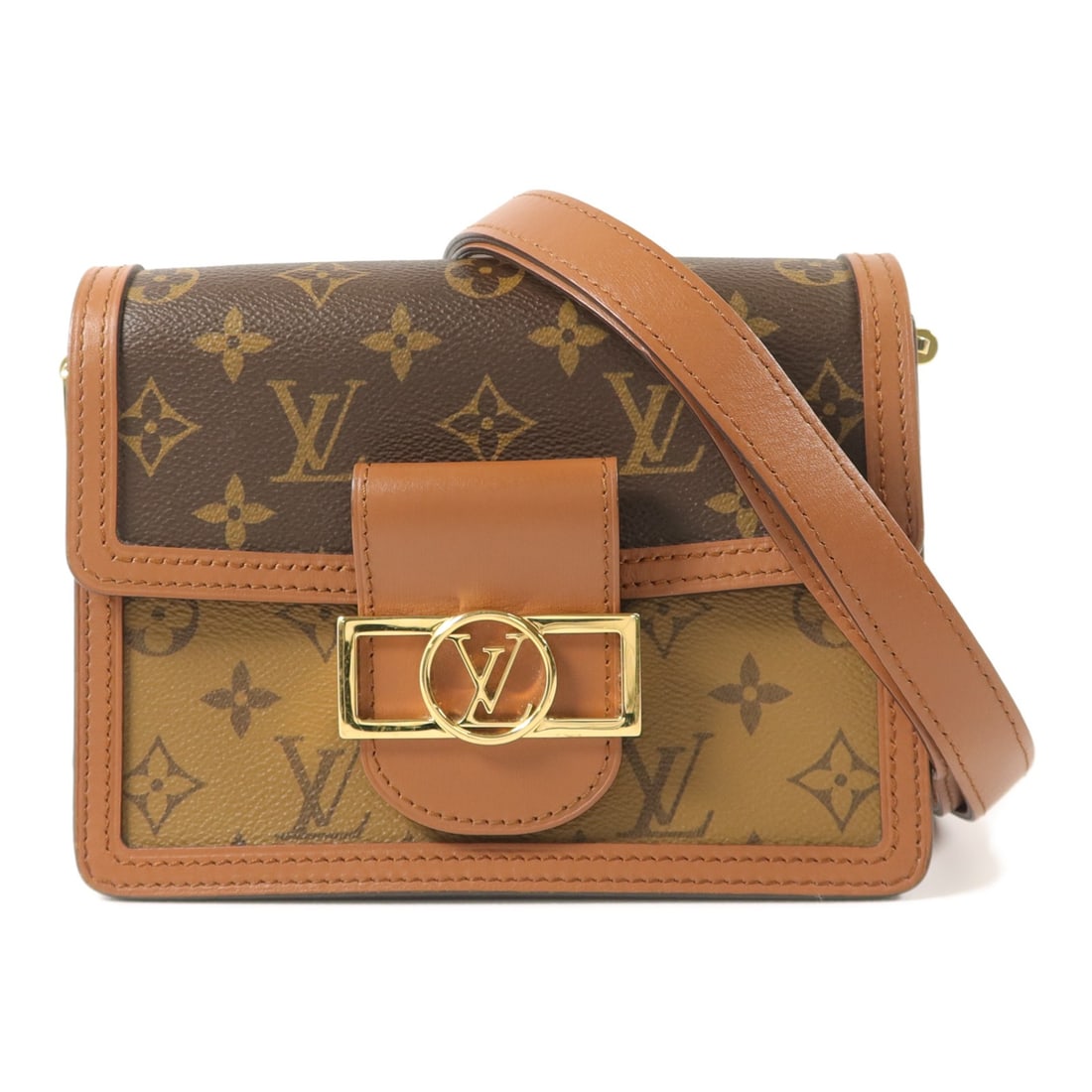 Louis Vuitton Mini Dauphine M45959 Shoulder Bag Monogram Reverse Brown: Louis Vuitton Mini Dauphine M45959 Shoulder Bag Monogram Reverse Brown The Mini Dauphine Shoulder Bag is presented in brown Monogram Reverse and PVC coated canvas. It features a flap pocket and an adj