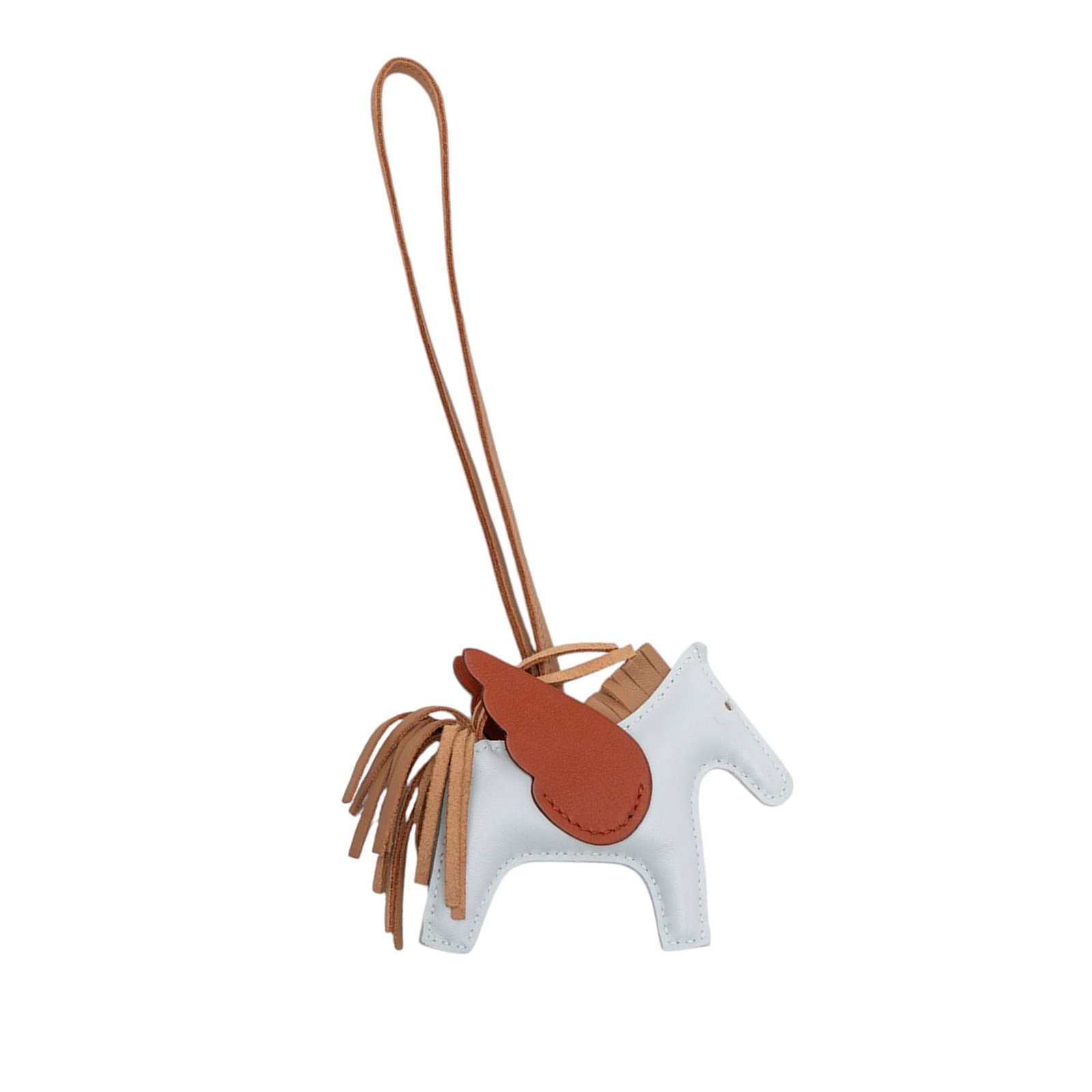 Hermes Rodeo Pegase PM bag charm in Milo lambskin and Swift leather: Hermes Rodeo Pegase PM bag charm in Milo lambskin and Swift leather Hermes Grigri Rodeo Pegase PM bag charm crafted in Milo lambskin and Swift leather. The design features Bleu Brume, Chai, and Cuivre