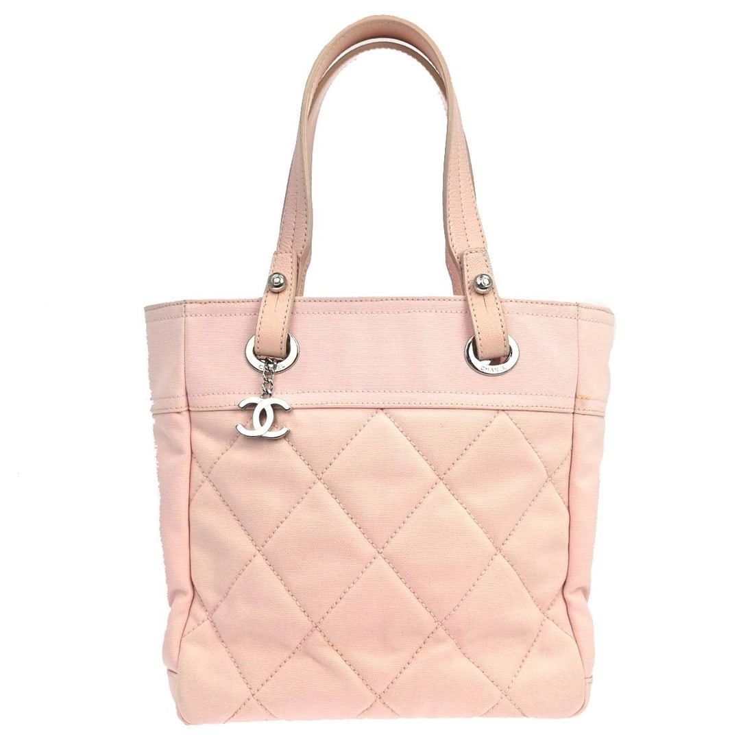 CHANEL Paris-Biarritz PM Pink Canvas Tote Bag: CHANEL Paris-Biarritz PM Pink Canvas Tote Bag Chanel Paris-Biarritz Tote PM handbag in pink canvas with double handles and zip closure. This medium tote features logo accents and inner pockets for org