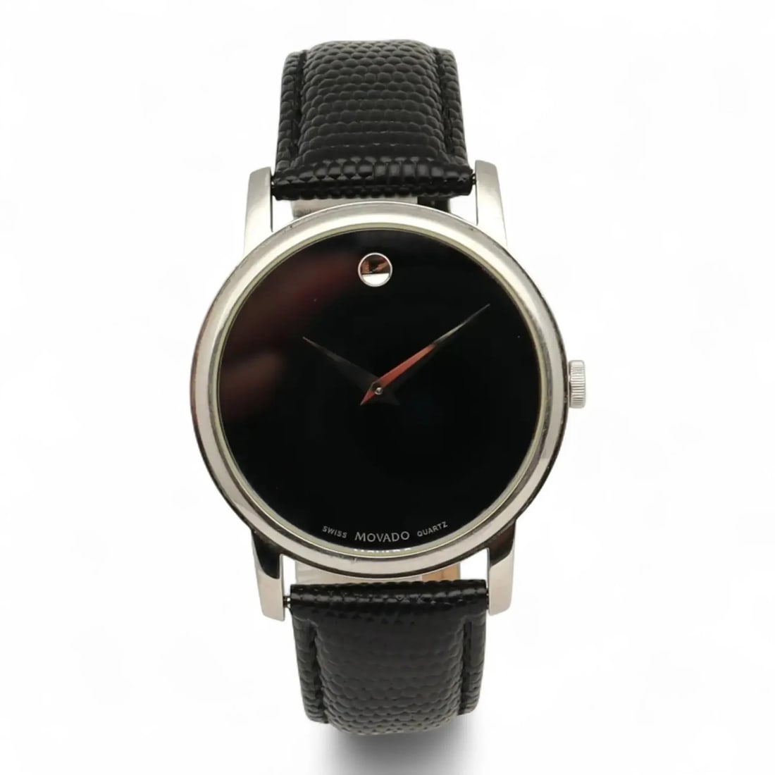 Movado Museum men's quartz watch 39mm steel case black dial: Movado Museum men's quartz watch 39mm steel case black dial Pre-owned Movado Museum men's wristwatch with a black analog dial and quartz movement. This dress/formal style watch features a stainless st