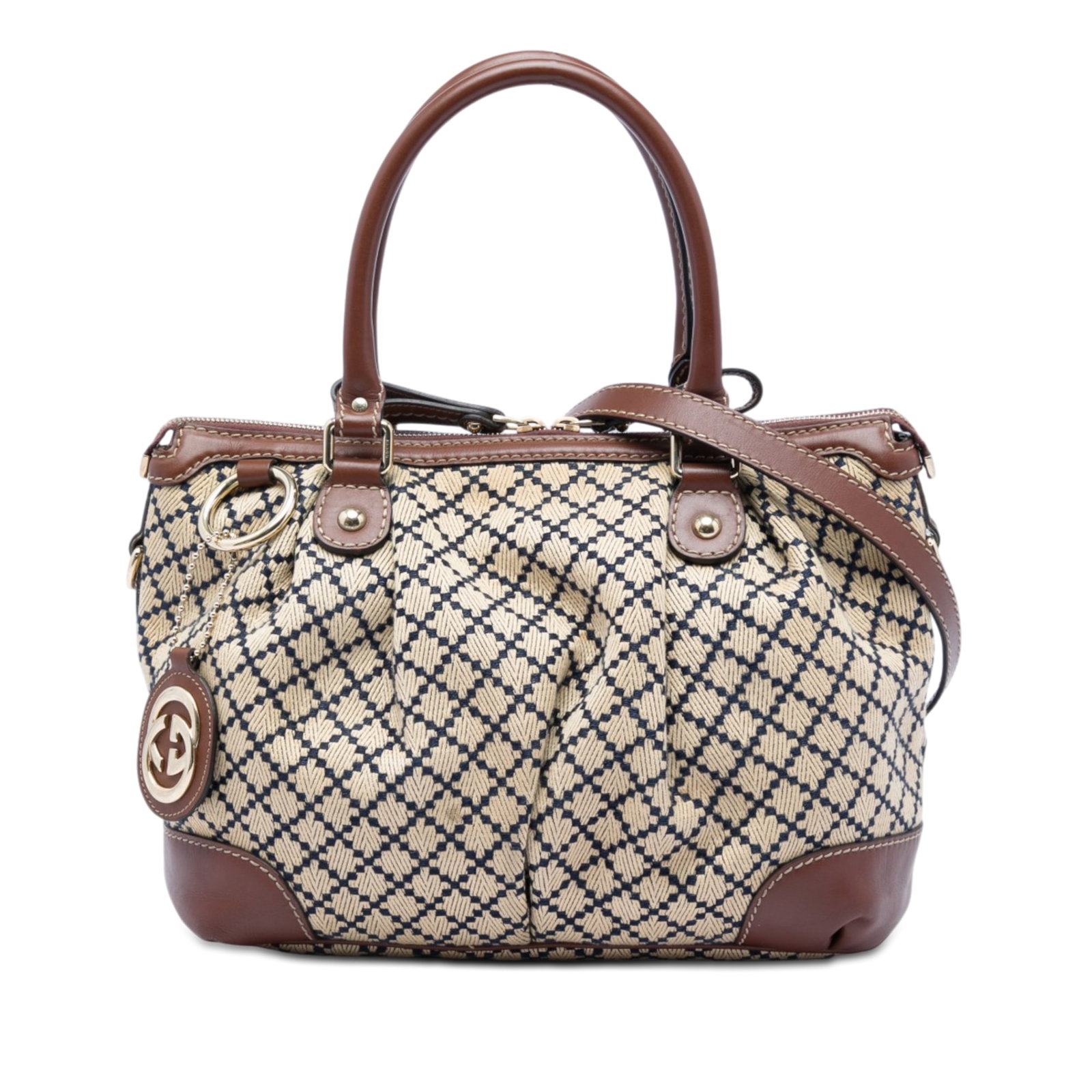 Gucci Sukey Satchel in Beige Diamante Canvas with Leather Trim: Gucci Sukey Satchel in Beige Diamante Canvas with Leather Trim Gucci Diamante Canvas Sukey satchel crafted with a canvas body and leather trim. This bag features rolled leather handles, a detachable f