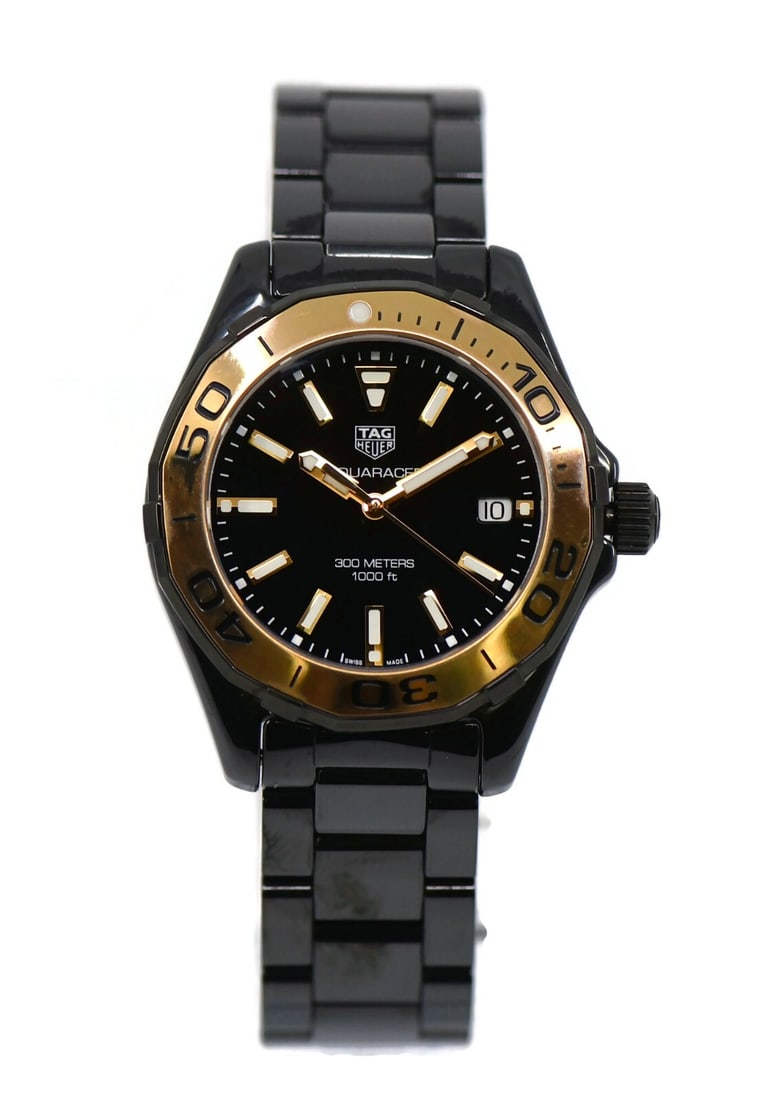 TAG Heuer Aquaracer Ceramic Watch WAY1355 with Box and Papers: TAG Heuer Aquaracer Ceramic Watch WAY1355 with Box and Papers Experience precision and elegance with the TAG Heuer Aquaracer Ceramic Watch (Model: WAY1355). This exquisite wristwatch features a sleek 