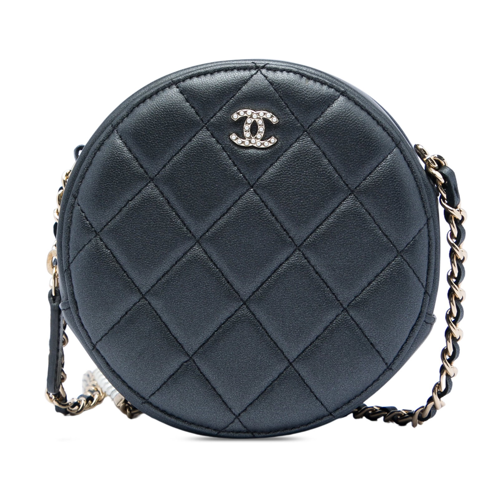 Chanel Pearl Chain Round Clutch in Quilted Iridescent Lambskin: Chanel Pearl Chain Round Clutch in Quilted Iridescent Lambskin Round crossbody clutch in quilted iridescent lambskin leather with a leather-woven chain strap accented by pearl details. The design feat