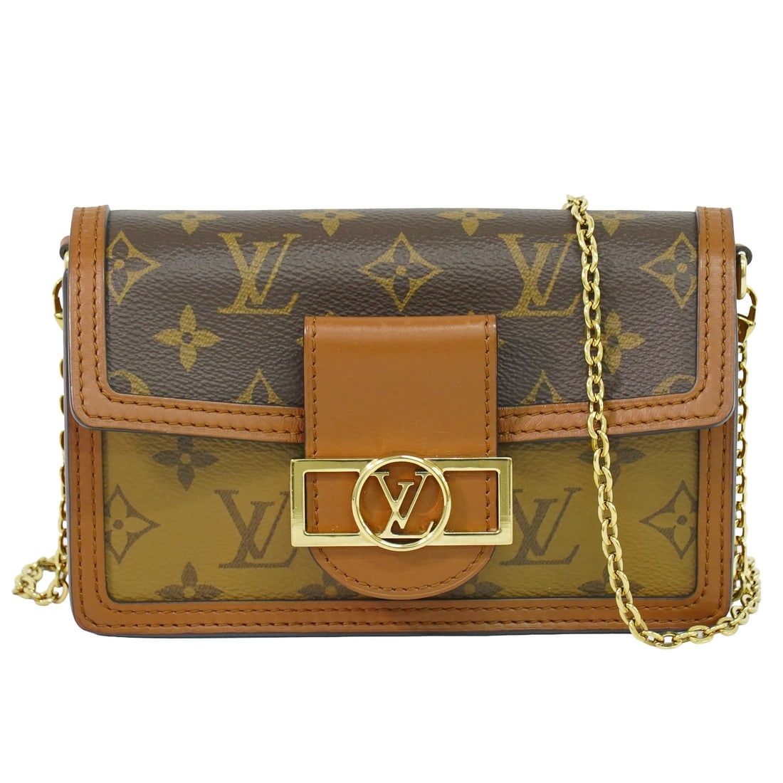 Louis Vuitton Dauphine Brown Canvas Handbag: Louis Vuitton Dauphine Brown Canvas Handbag Louis Vuitton Dauphine bag in brown canvas with a reverse monogram design. Made in France, this piece is presented in good condition with light wear and lig