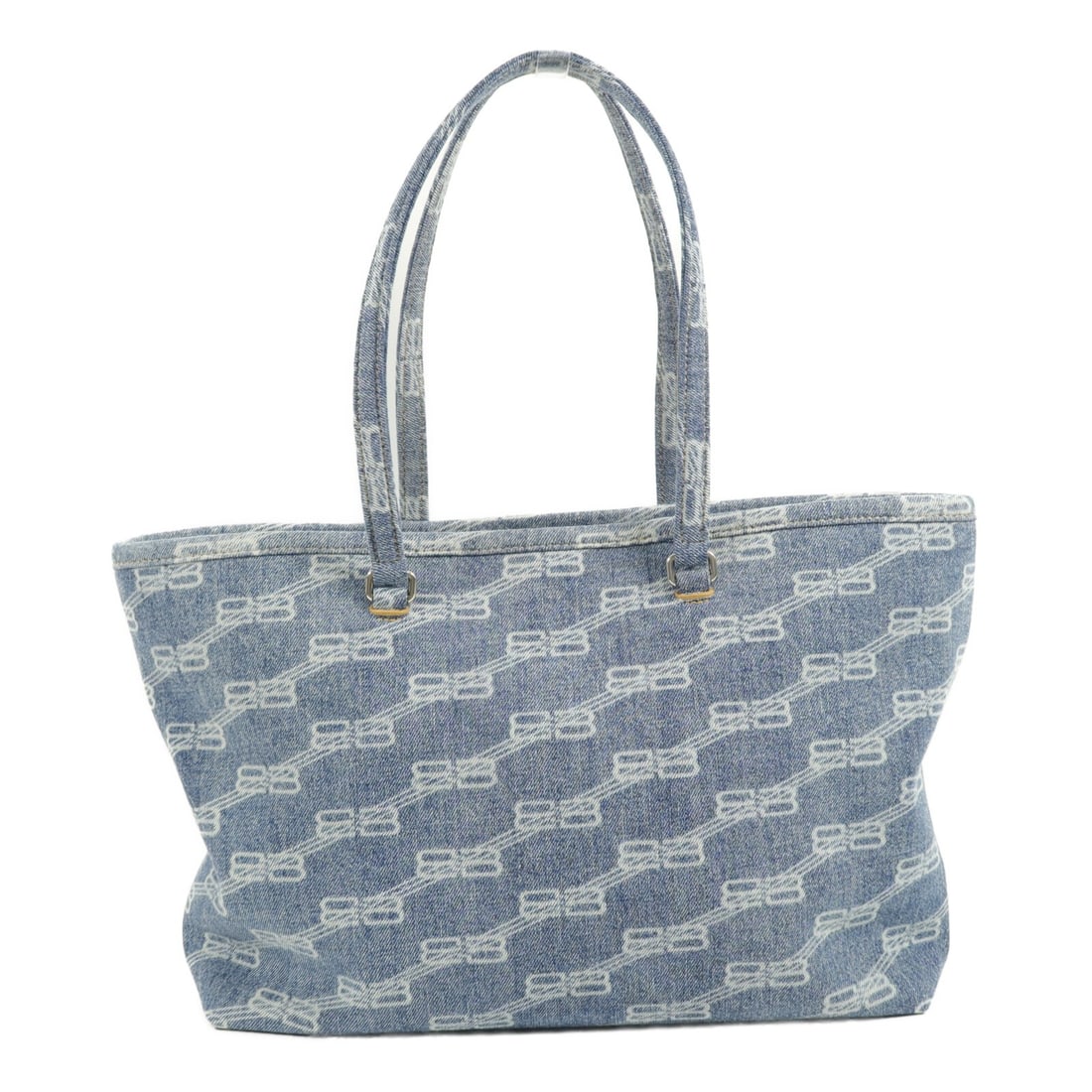 Balenciaga 702698 BB Signature denim shopper tote in blue: Balenciaga 702698 BB Signature denim shopper tote in blue Balenciaga BB Signature Shopper tote bag in blue denim with silver-tone hardware. This women's tote features a spacious open-top shopper silho