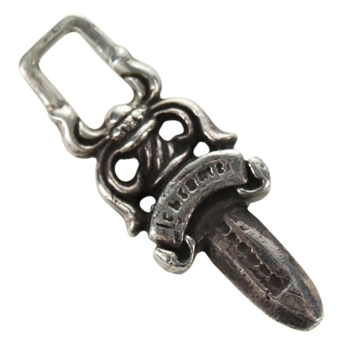 Chrome Hearts Ag925 Silver Pendant Top Dagger Charm: Chrome Hearts Ag925 Silver Pendant Top Dagger Charm Chrome Hearts dagger charm pendant top in silver, made from Ag925 silver. The item is in Rank B condition with reasonable wear and tear, showing sli