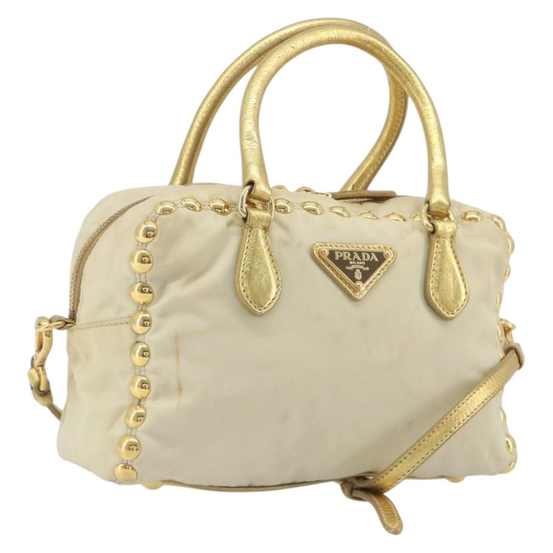 PRADA beige nylon shoulder handbag with strap gold tone: PRADA beige nylon shoulder handbag with strap gold tone Authentic Prada 2-way shoulder bag in beige nylon with gold-tone accents. Made in Italy, this women's bag includes a shoulder strap and can be c
