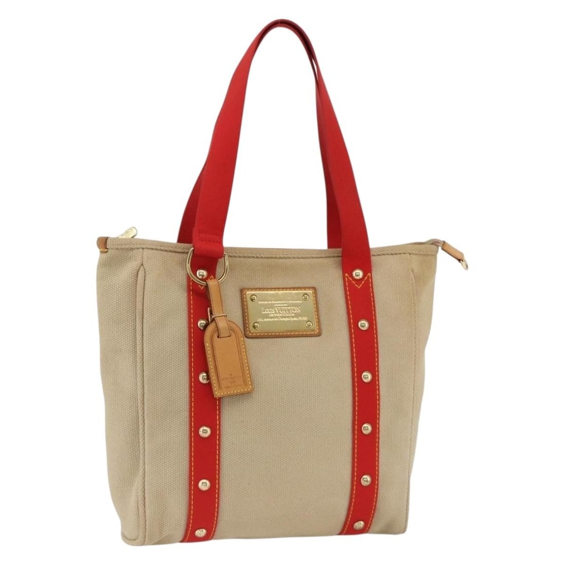 Louis Vuitton M40035 Antigua Cabas MM canvas tote beige red: Louis Vuitton M40035 Antigua Cabas MM canvas tote beige red Louis Vuitton Antigua Cabas MM tote bag in beige and red canvas. This women's tote includes a name tag and was made in France. Condition is 