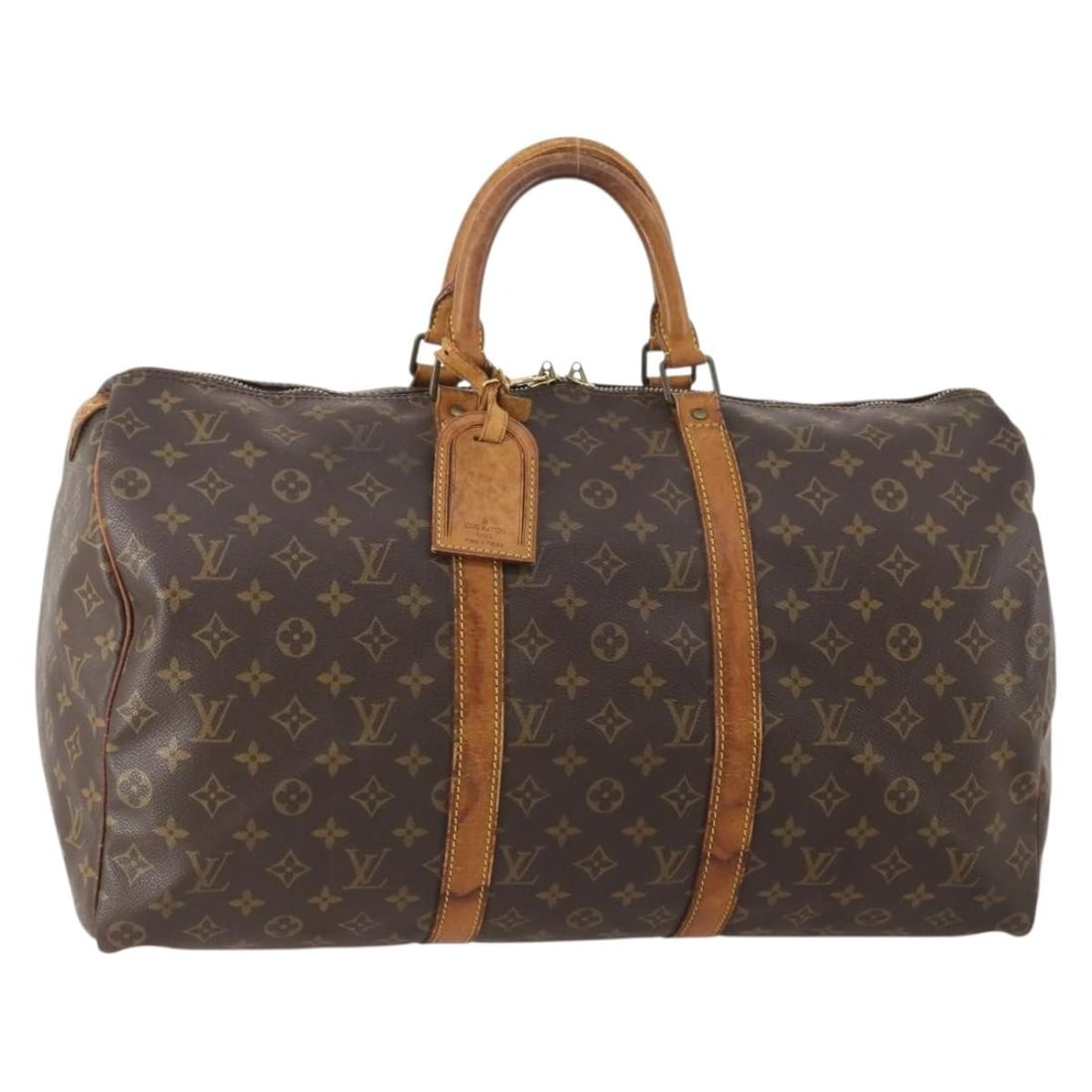 Louis Vuitton M41426 Keepall 50 Monogram Canvas Boston Bag: Louis Vuitton M41426 Keepall 50 Monogram Canvas Boston Bag Louis Vuitton Keepall 50 Boston bag in Monogram canvas with a name tag accessory. Made in France, this heavily used bag shows notable wear th