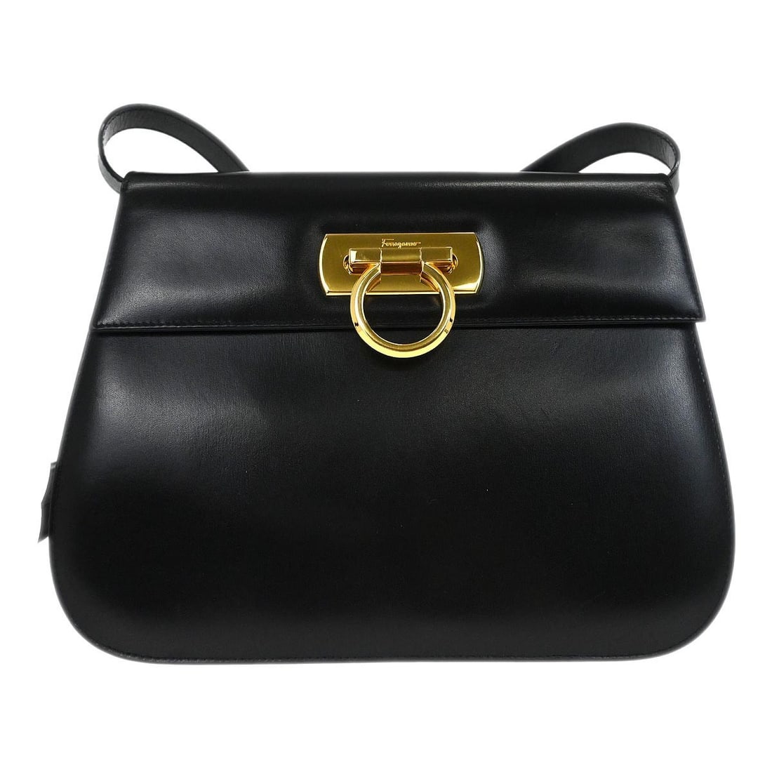 Salvatore Ferragamo Gancini Black Leather Shoulder Bag E21 2682: Salvatore Ferragamo Gancini Black Leather Shoulder Bag E21 2682 Salvatore Ferragamo Gancini shoulder bag in black leather with logo accents. This medium women's bag is made in Italy and features one i