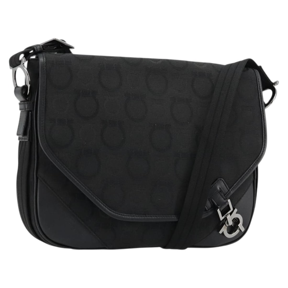 Salvatore Ferragamo Gancini Canvas Shoulder Bag Black Silver: Salvatore Ferragamo Gancini Canvas Shoulder Bag Black Silver Salvatore Ferragamo Gancini shoulder bag in black and silver canvas, made in Italy. Designed for women, this shoulder bag features a strap 