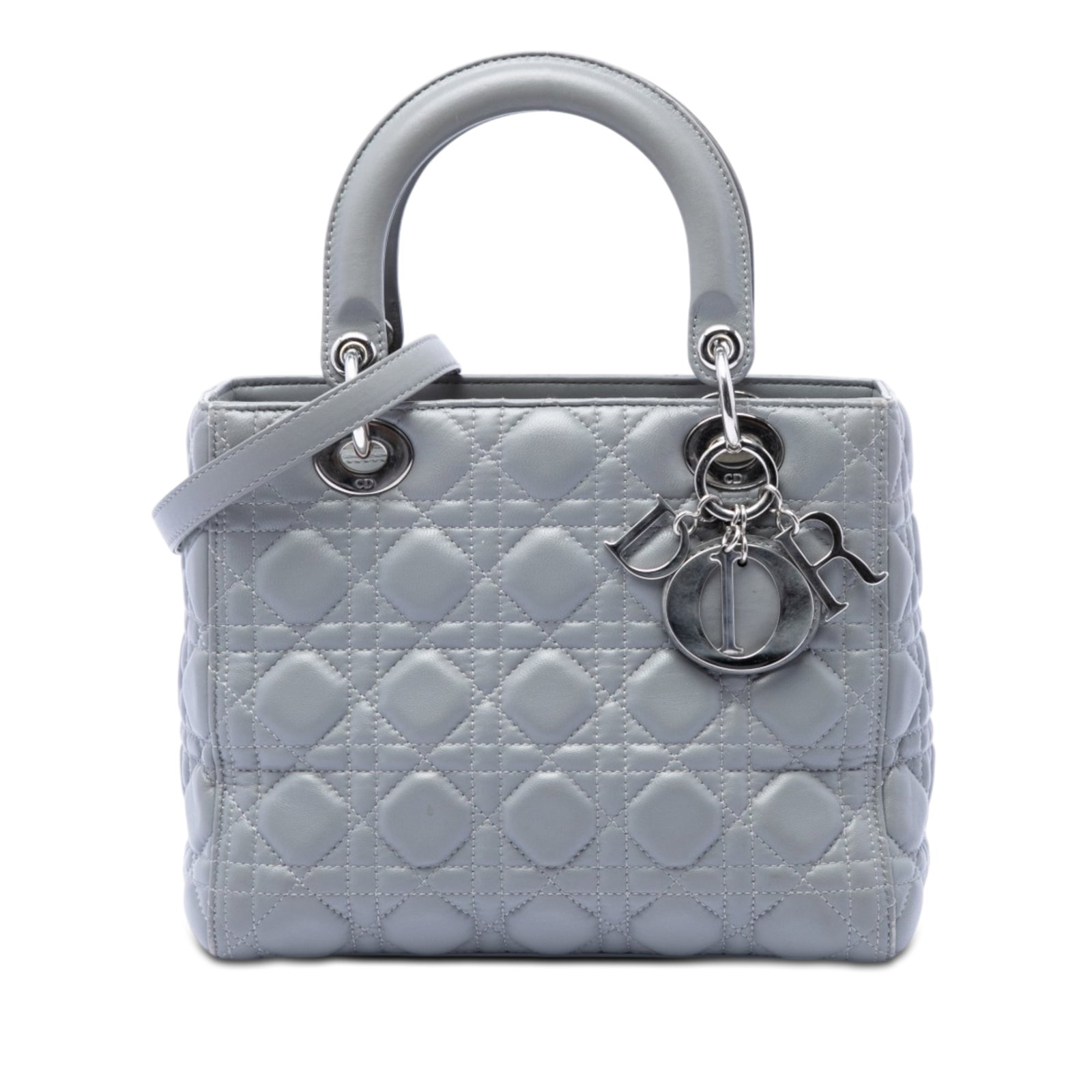 Dior Lady Dior medium gray metallic lambskin bag: Dior Lady Dior medium gray metallic lambskin bag Medium Lady Dior handbag in metallic gray quilted lambskin leather with Cannage detailing. This bag features flat leather top handles, a detachable fla