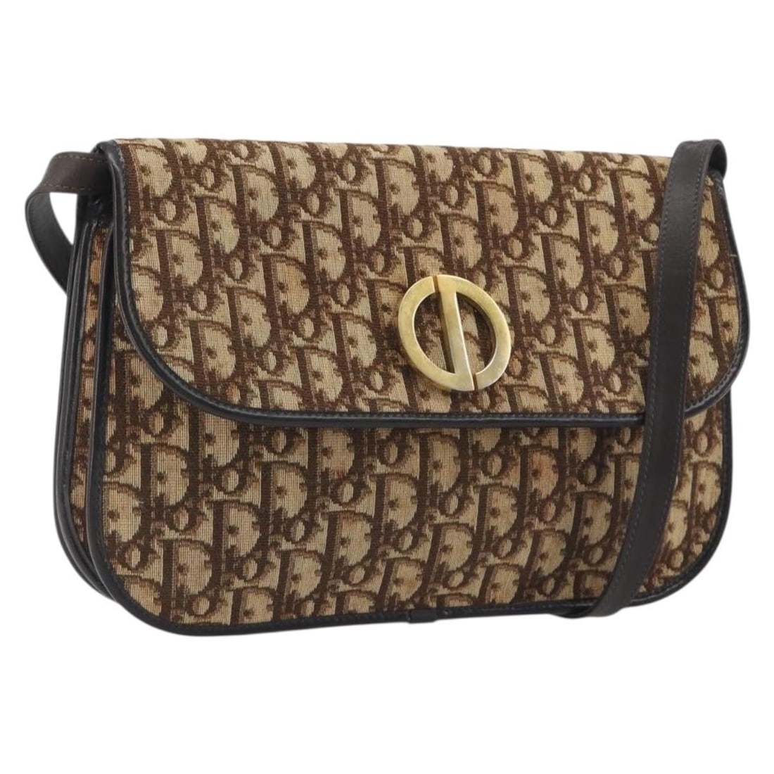 Christian Dior Beige Gold Trotter Canvas Shoulder Bag: Christian Dior Beige Gold Trotter Canvas Shoulder Bag Christian Dior shoulder bag crafted in beige and gold Trotter canvas. This women's bag was made in France and features an adjustable shoulder stra