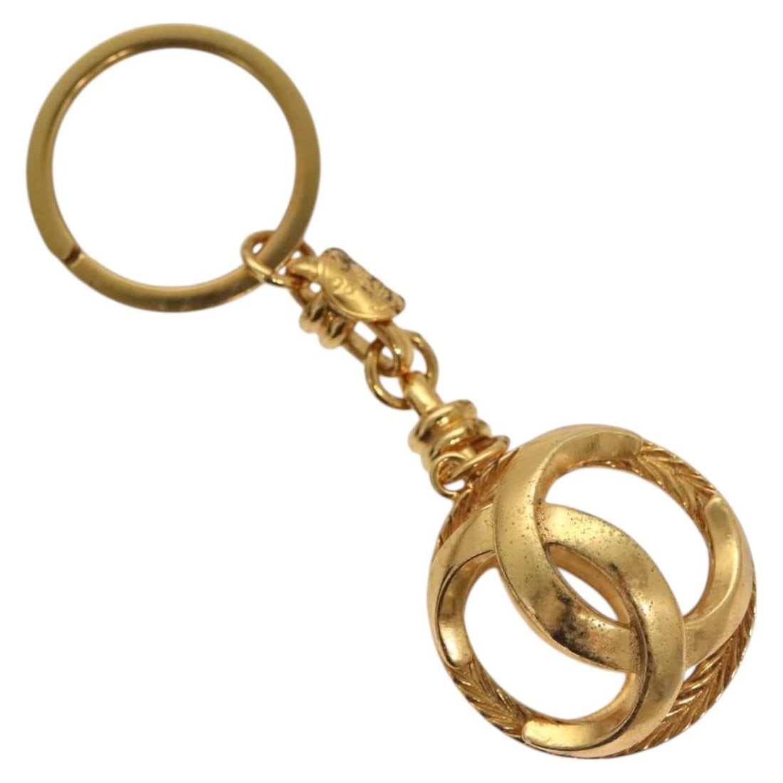 Gold Metal CHANEL Coco Mark Key Ring France: Gold Metal CHANEL Coco Mark Key Ring France CHANEL COCO Mark key ring in gold-tone metal, made in France. It comes with the item box and is described as a women's accessory. Condition is Rank B / reas